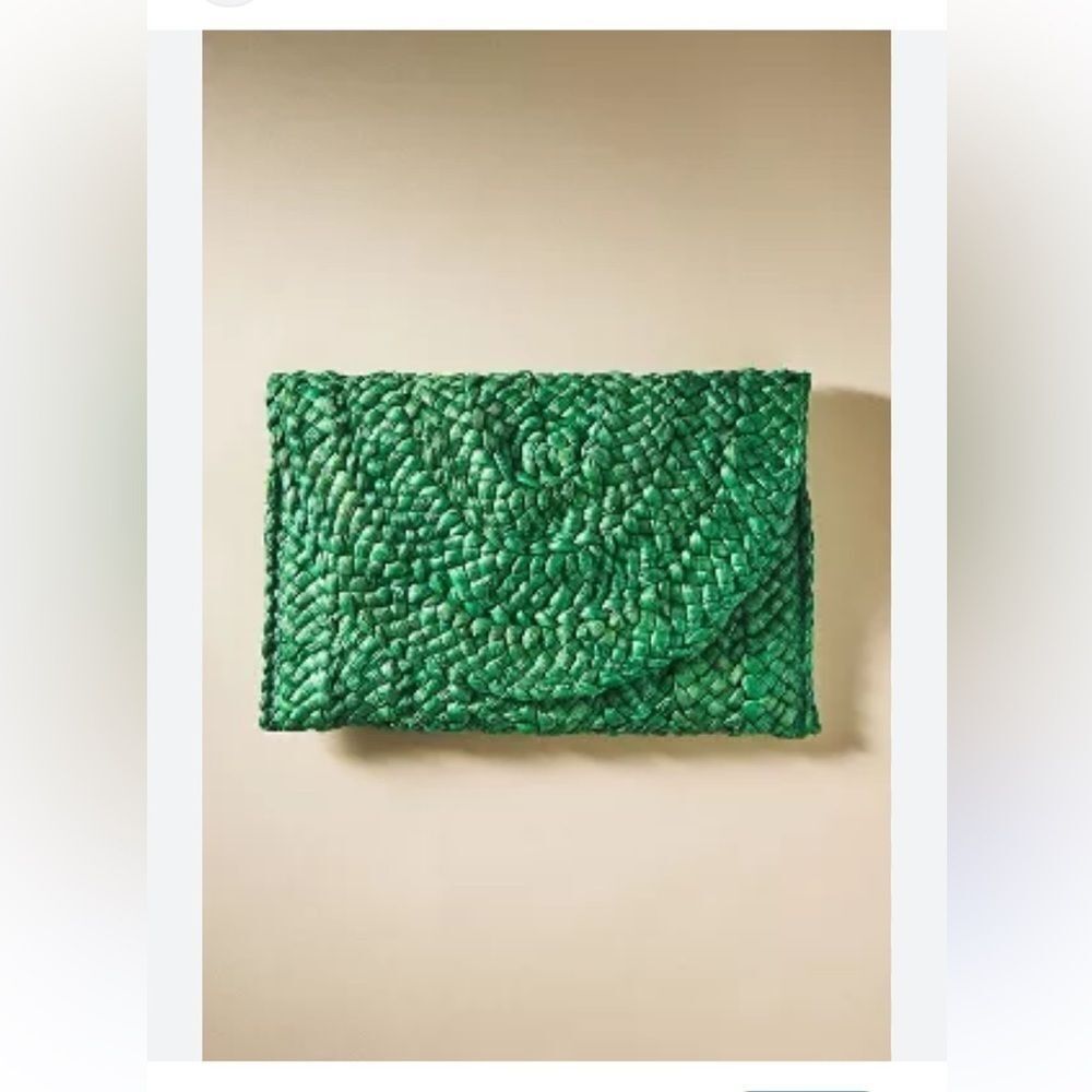 Simonetta Straw Clutch
By Anthropologie Green